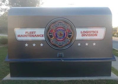 Large sign reads "Fleet Maintenance Logistics Division" with a High Point Fire Rescue emblem in center.